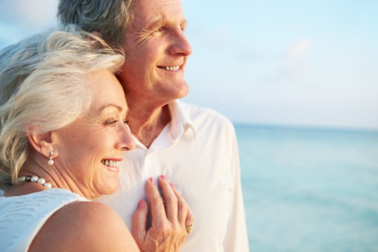 old couple looking at the sea