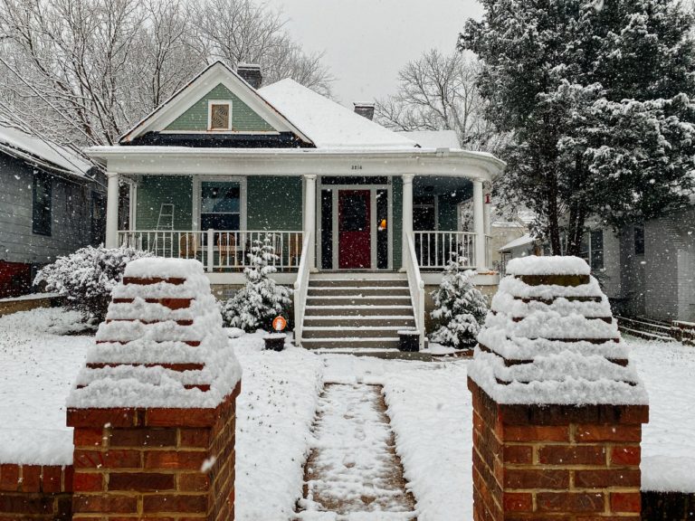 a home covered in snow