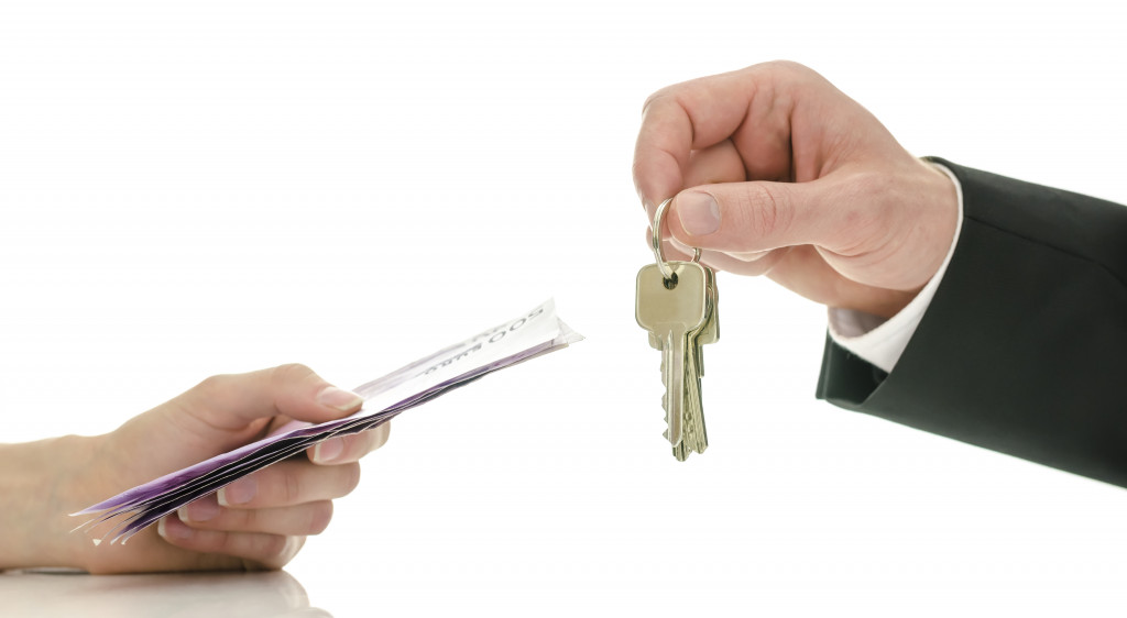 handing over keys to buyer